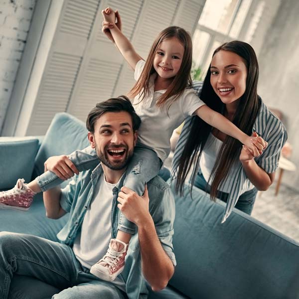 family playing on couch
